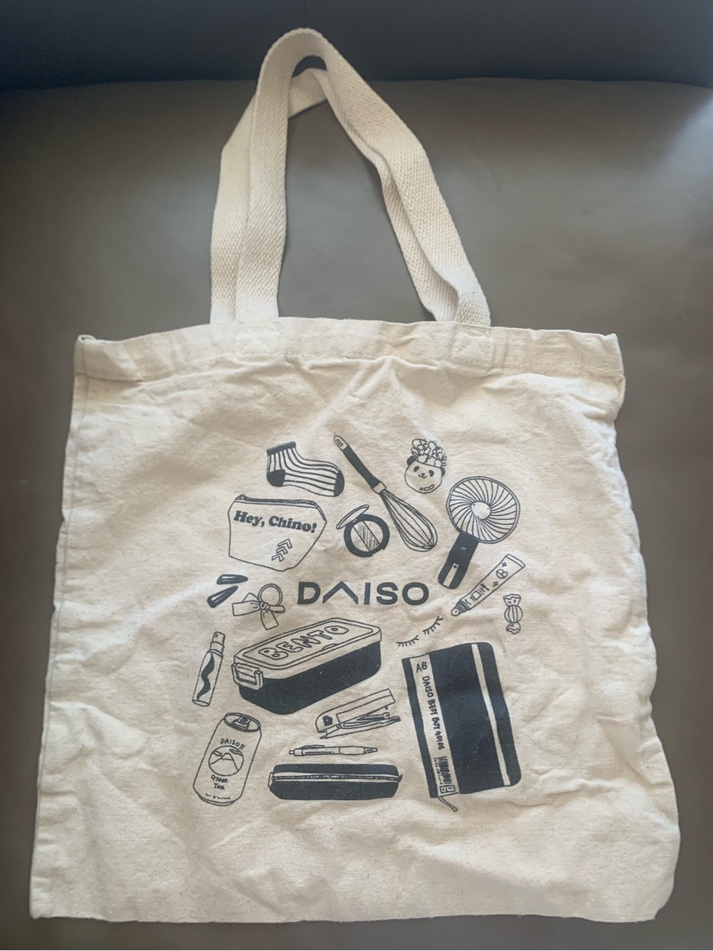 EXCLUSIVE GRAND OPENING ๐ผ ๐ชฅ๐โโ๏ธ Daiso Cream Canvas Tote with Black Graphic Print